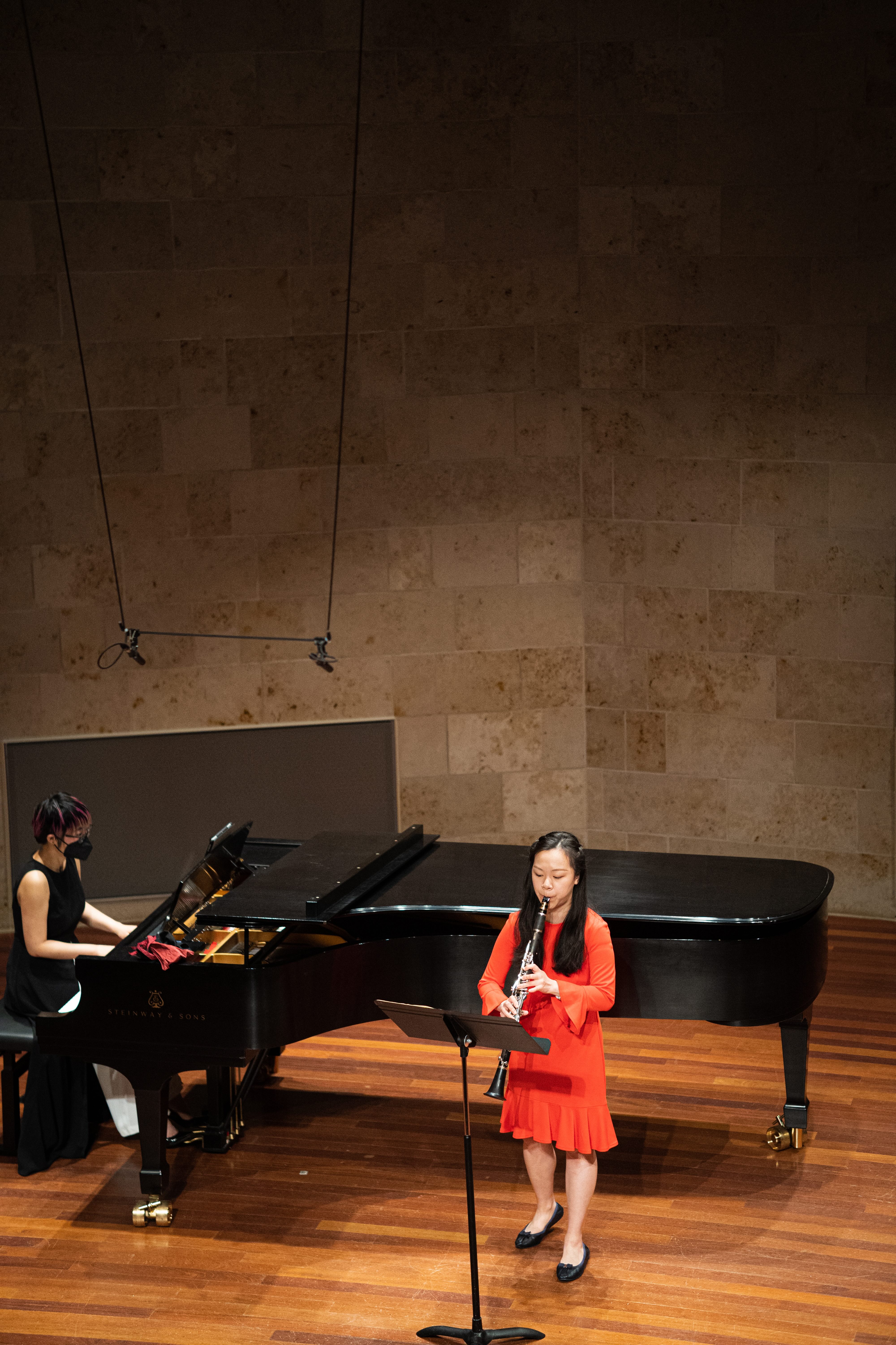 Yijin Wang performing in recital